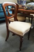 A set of six Victorian mahogany dining chairs.