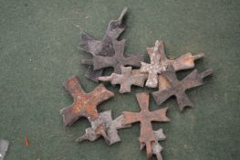 Small bronze Roman crosses.