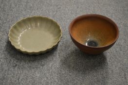 A Chinese hare's fur bowl and a Celadon lobed dish.