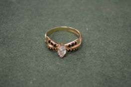 A 9ct gold dress ring.