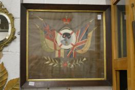 A sailor's love token, an embroidered picture, framed and glazed.