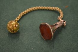 A 9ct gold fob and chain.