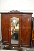 A Victorian mahogany breakfront three-door wardrobe.
