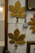 A pair of leaf shaped wall sconces.