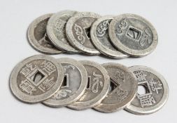 TEN CHINESE SILVER COINS.