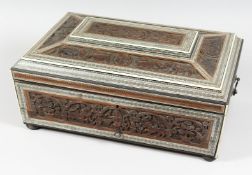 A GOOD SANDALWOOD AND CARVED CEDAR WOOD WORK BOX with carved panels and fitted interior with mirror.