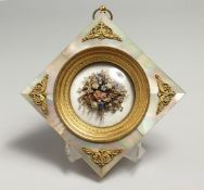 A SUPERB PALAIS ROYAL FRAMED MINIATURE BOUQUET OF FABRIC FLOWERS in a mother of pearl frame, with