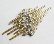 A VERY GOOD 18CT GOLD, DIAMOND BROOCH signed by David Yurman.