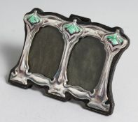 A SMALL SILVER AND ENAMEL DOUBLE FRAME