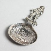 A SMALL DUTCH SILVER CADDY SPOON.