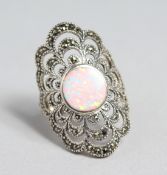 A SILVER AND OPAL FILIGREE MARCASITE DRESS RING.