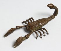 A SMALL JAPANESE BRONZE ARTICULATED SCORPION. 3.5ins long.