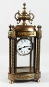 A GOOD GiLT BRONZE FOUR GLASS CLOCK with urn finial. 22ins high.
