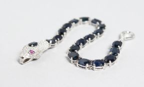 A SILVER SAPPHIRE AND RUBY SNAKE BRACELST.