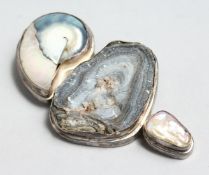 A SILVER MINERAL AND MOTHER OF PEARL BROOCH.