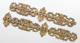 A PAIR OF GILDED METAL BELL PULLS. 36ins x 7ins