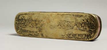 A LONG DUTCH BRASS TOBACCO BOX AND COVER, decorated with circular vignettes. 16cm long, 4.5cm wide.
