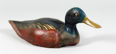 A PAINTED DECOY DUCK. 13ins long.