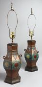 A PAIR OF CHINESE BRONZE AND CLOISONNE ENAMEL LAMPS. 18ins high.