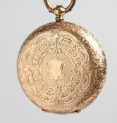 A LADIES 18CT ENGRAVED POCKET WATCH.