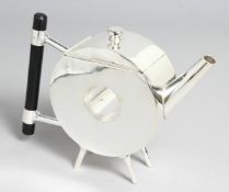 A CHRISTOPHER DRESSER DESIGN CIRCLE WITH HOLE, SILVER PLATED TEA POT.