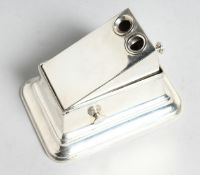A RECTANGULAR DOUBLE CIGAR CUTTER by Elkington. Birmingham 1933. 4.5ins x 2.5ins x 2ins.