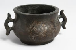 A GOOD CHINESE SILVER INLAID CIRCULAR TWO HANDLED CENSER, impressed mark, 4.75ins diameter.