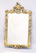 A ROCCOCO STYLE GILT FRAMED PIER MIRROR. 3ft 6.5ins high x 2ft 2ins wide.