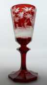 A SUPERB LARGE BOHEMIAN RUBY TINTED TAPERING GOBLET engraved with fruiting vines on an octagonal