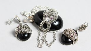 A SILVER MARCASITE AND ONYX PANTHER NECKLACE.