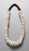 A PAPUA NEW GUINEA SHELL NECKLACE.