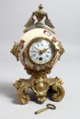 A GOOD 19TH CENTURY FRENCH PORCELAIN AND ORMOLU SMALL MANTLE CLOCK with urn finial, enamel dial with