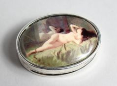 A SILVER OVAL SNUFF BOX the lid with a nude.