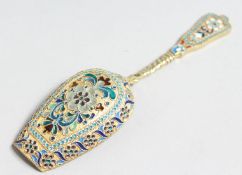 A RUSSIAN SILVER AND ENAMEL SHOVEL. Mark 84, 13cm long.