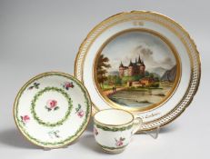 A SEVRES PORCELAIN CUP AND SAUCER painted with flowers and chains of husks and a PARIS PORCELAIN