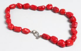 A CORAL NUGGET BEAD NECKLACE.