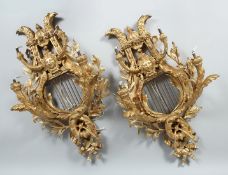 A GOOD PAIR OF CLASSICAL REVIVAL ORMOLU FOUR LIGHT WALL APPLIQUES, of lyre form with eagle head