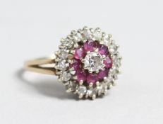 A RUBY DIAMOND CLUSTER RING.