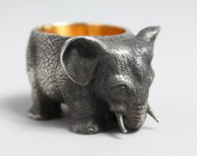 A CAST RUSSIAN SILVER ELEPHANT SALT with gilt interior. Mark 84, 4.5cm long.