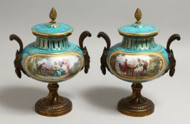 A VERY GOOD PAIR OF 19TH CENTURY SEVRES PALE BLUE CIRCULAR URNS AND COVERS painted with reverse