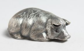 A SMALL RUSSIAN SILVER SLEEPING PIG. Faberge mark I P., Head and 88. 6cm.