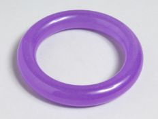A LAVENDER JADE BANGLE, 3ins diameter.