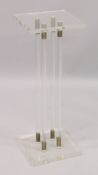 A SQUARE PERSPEX STAND. 2ft high.