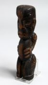 A MAORI CARVING. 7.5ins long.