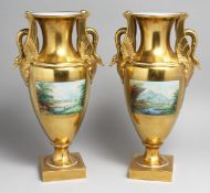 A GOOD PAIR OF DRESDEN TWO HANDLED GILT VASES painted with reverse landscape panels. 13ins high.