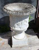 A PAIR OF CARVED WHITE MARBLE URNS ON STANDS. Urns 40.5