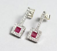 A PAIR OF 18CT GOLD RUBY AND DIAMOND EARRINGS