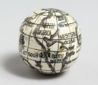 A BONE GLOBE COMPASS. 1.25ins