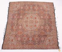 A FINE KASHMIRI SHAWL with a central circular design and similar shaped panels to each corner. 5ft