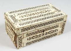 A GOOD NAPOLEONIC CARVED AND PAINTED BONE BOX. 8.5ins long.